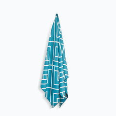 Teal Newlyfe waffle-weave bath towel hanging