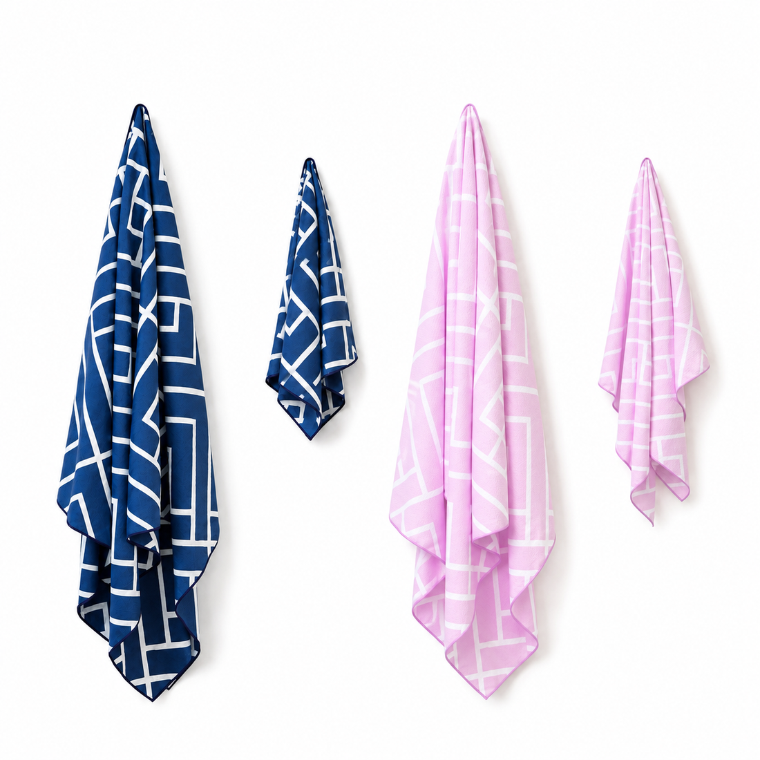 Navy and pink Newlyfe bath towels with matching mini towels